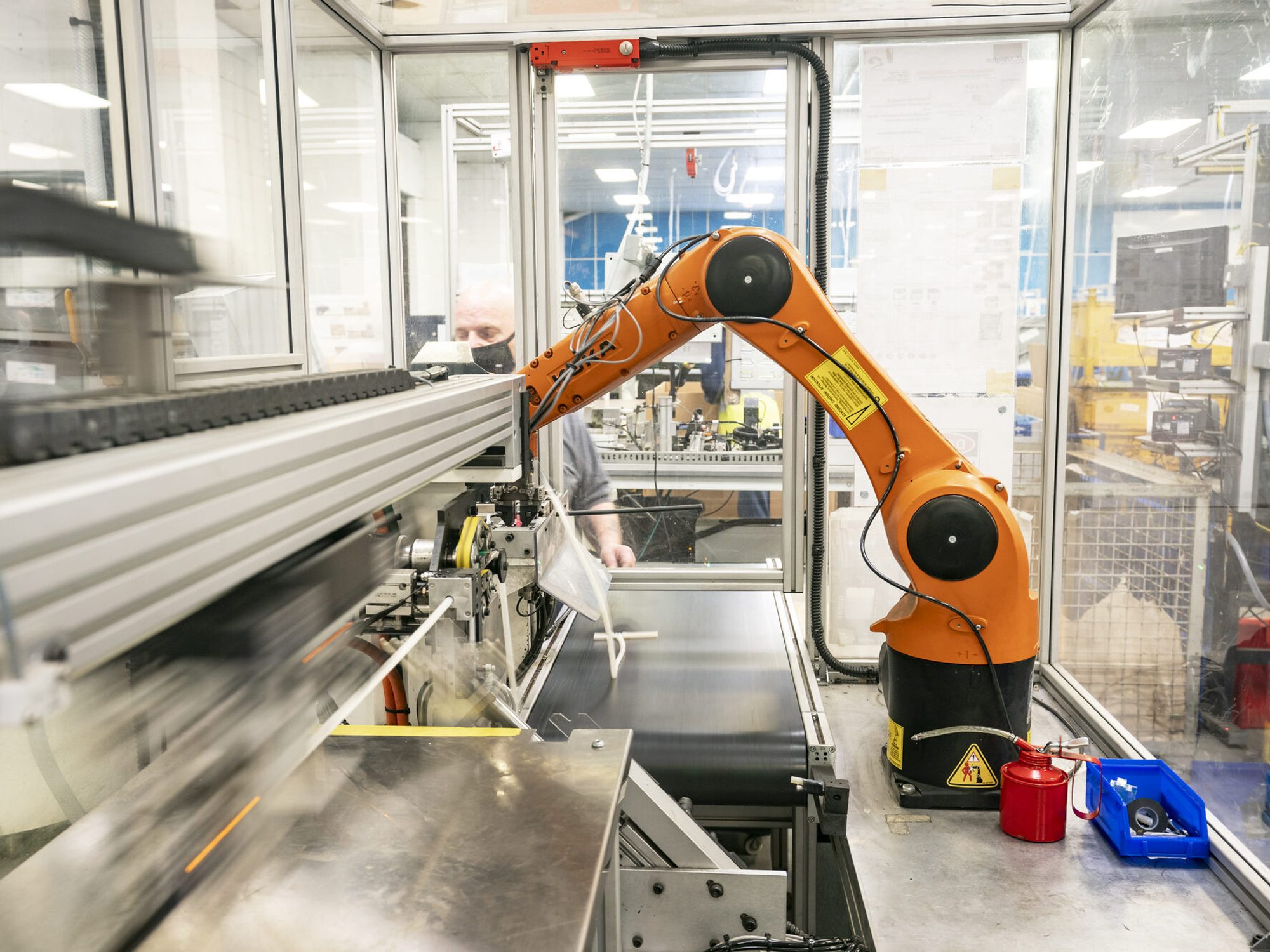 A robotic arm working alongside the assembly line at the Coventry plant